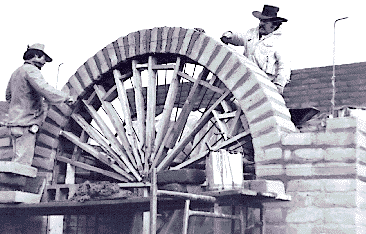 [Bender board framework with first course of mud brick: 27k]