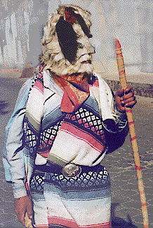 [Chapayeka wearing white fur hide mask: 39k]