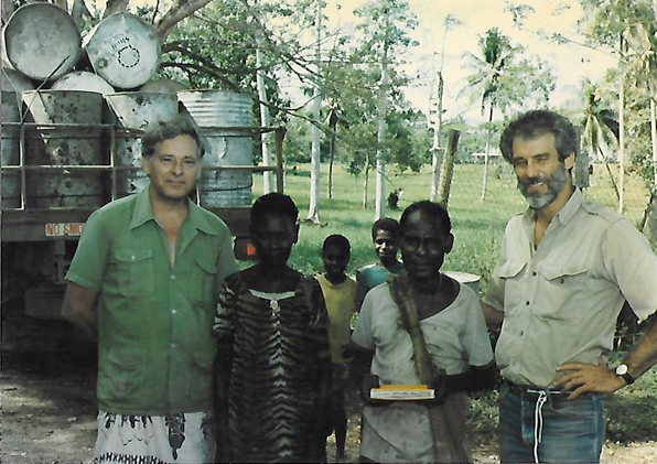 [Peter Johnson, Ron Perry, Partamun with Peter's truck loaded with 44 gallon fuel drums, Angoram, ESP, PNG, a patrol post on the Sepik River: 373k]