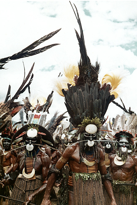 [Dramatic front of warriors with black hairwigs, towering black plumes, blackened faces: 279k]